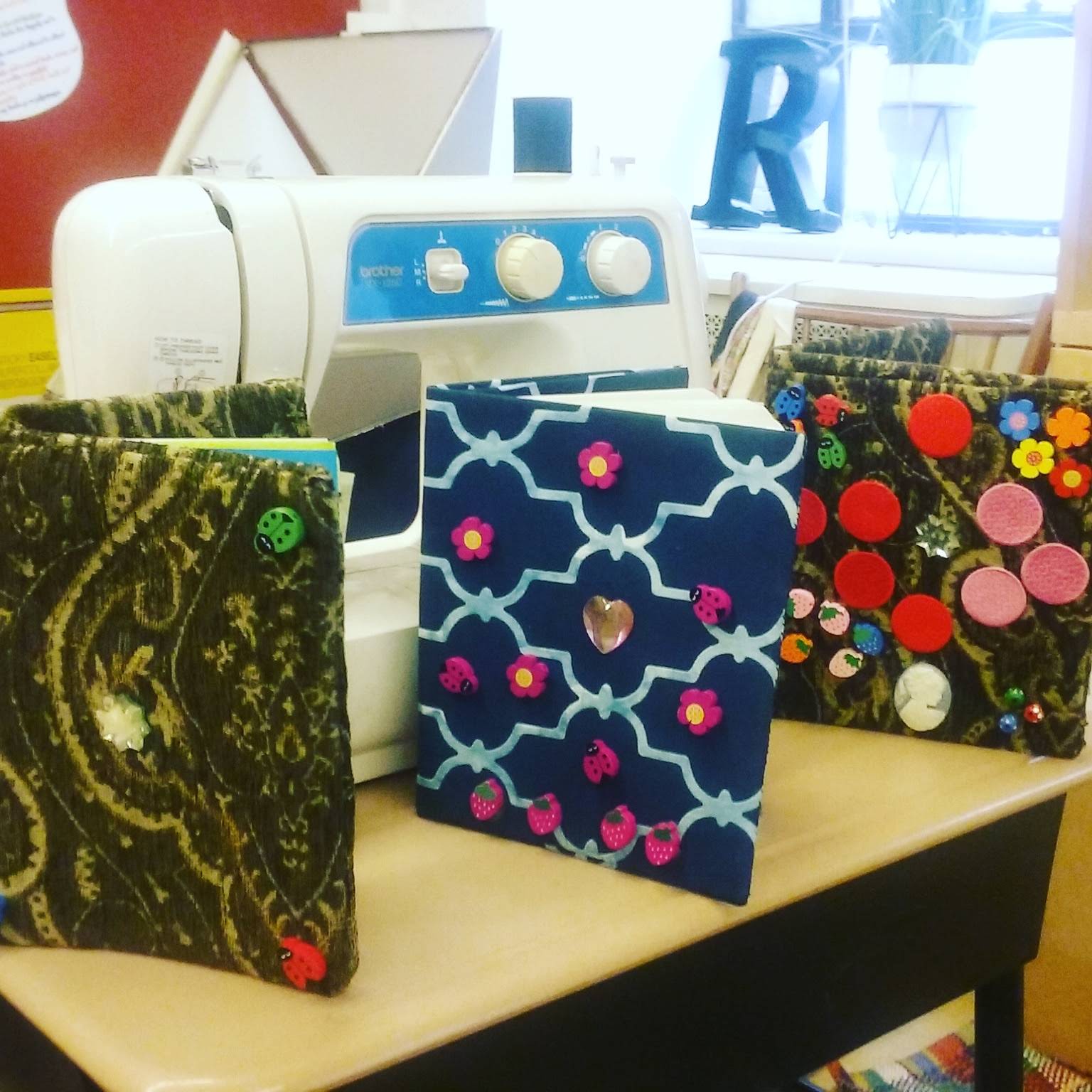 3 books created and designed by students in It's Sew Fun!